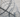 Razor wire fence surrounding a correctional facility, symbolizing prison security and controlled environments