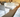 Dormitory-style homeless shelter with multiple beds providing safe housing for residents