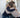 Two women hugging in a support group session, symbolizing encouragement and recovery in addiction treatment
