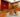 Empty courtroom with wooden judge’s bench, jury box, and red curtain backdrop—symbolizing court-ordered drug testing and legal compliance in the United States.